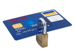 A padlock through a credit card showing that the credit card information is secure